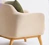 Cream armchair with an olive cushion, generated side view