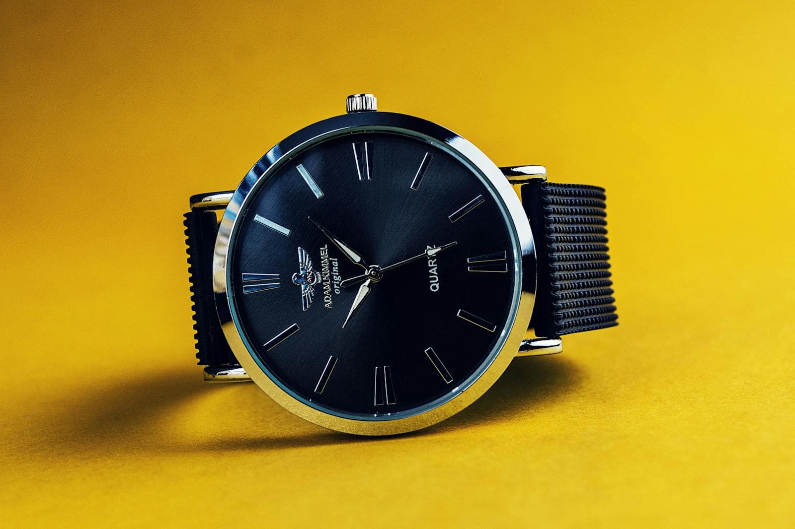 Macro shot of a luxury wristwatch.
