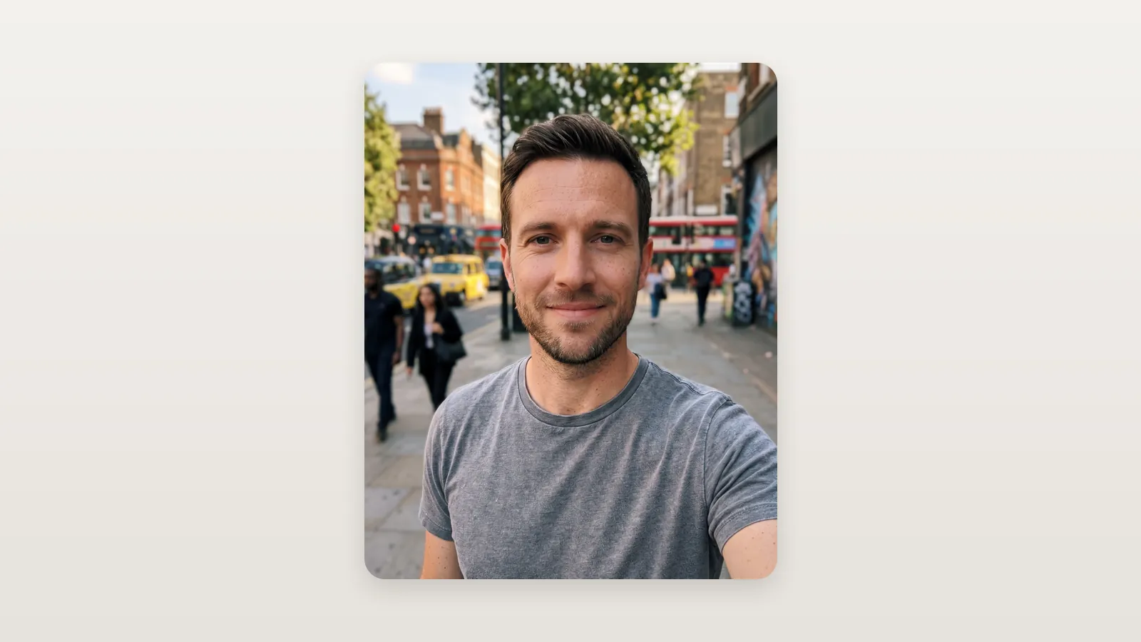 A casual street selfie of a man facing the camera
